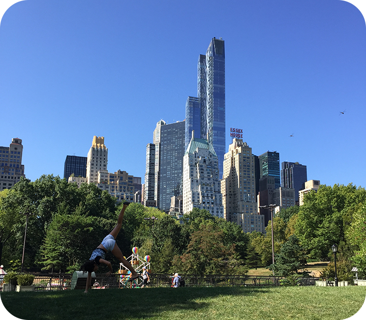 Girl Doing Cartwheel in Central Park New York