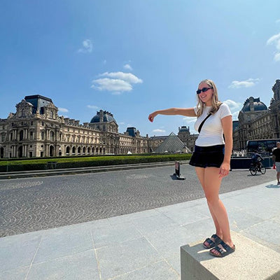 Woman Standing Outside Louvre