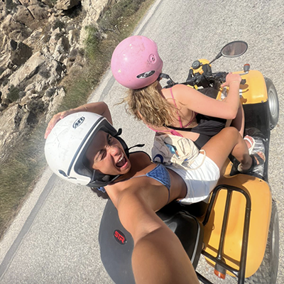 Girls Riding Quadbike in Greece